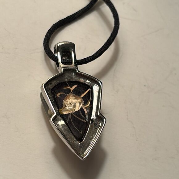 Black crafted glass floral pendant with reverse etched design on black cord - Picture 2 of 7